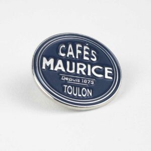 Face avant du Pin’s du logo Cafés Maurice
